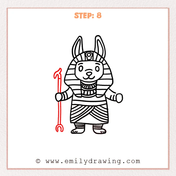 how to draw an anubis - Step 8: A tall staff is added and held by Anubis to strengthen the pose.