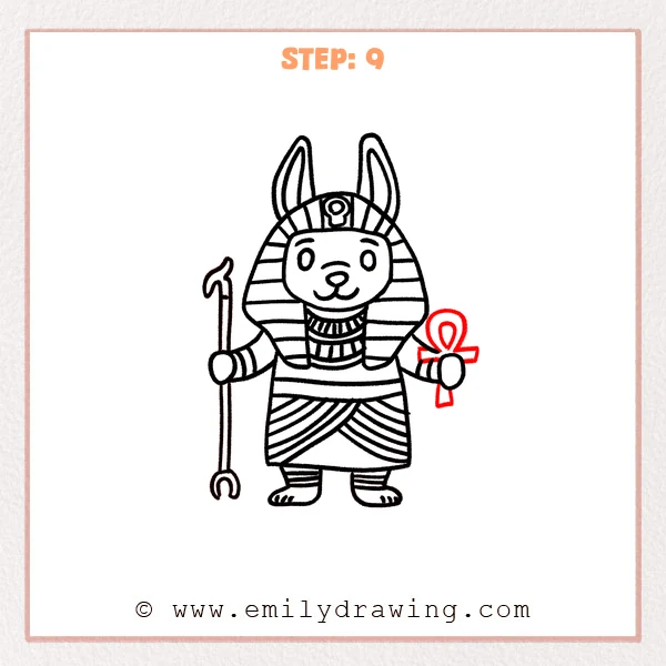 how to draw an anubis - Step 9: An ankh is added and the Anubis drawing is finalized with clean bold outlines.