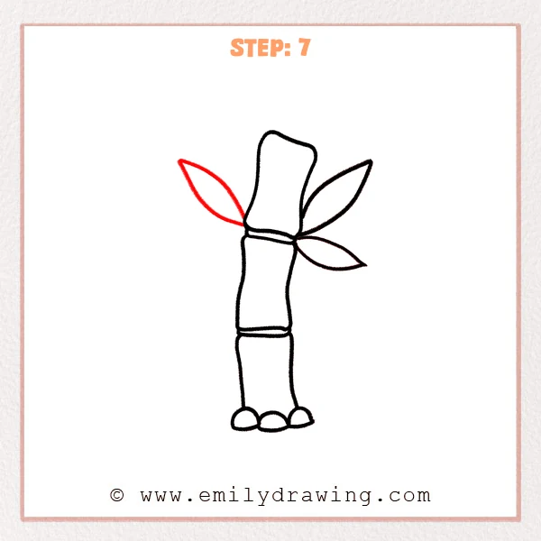 how to draw a bamboo - Step 7: One large bamboo leaf added on the left side to balance the leaf cluster.