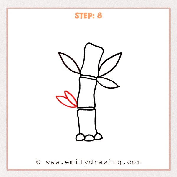 how to draw a bamboo - Step 8: A small cluster of two short bamboo leaves added on the lower left side.