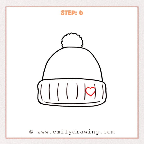 how to draw a beanie - Step 6: A small heart is added on the beanie cuff and the outline is refined.