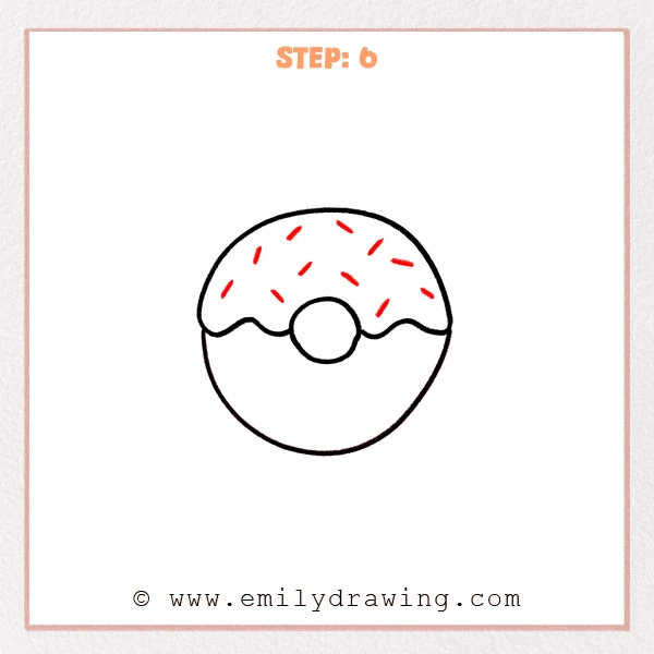 how to draw a donut - Step 6 of the donut drawing adds short sprinkle marks across the icing on the top half, giving the donut a decorated look.
